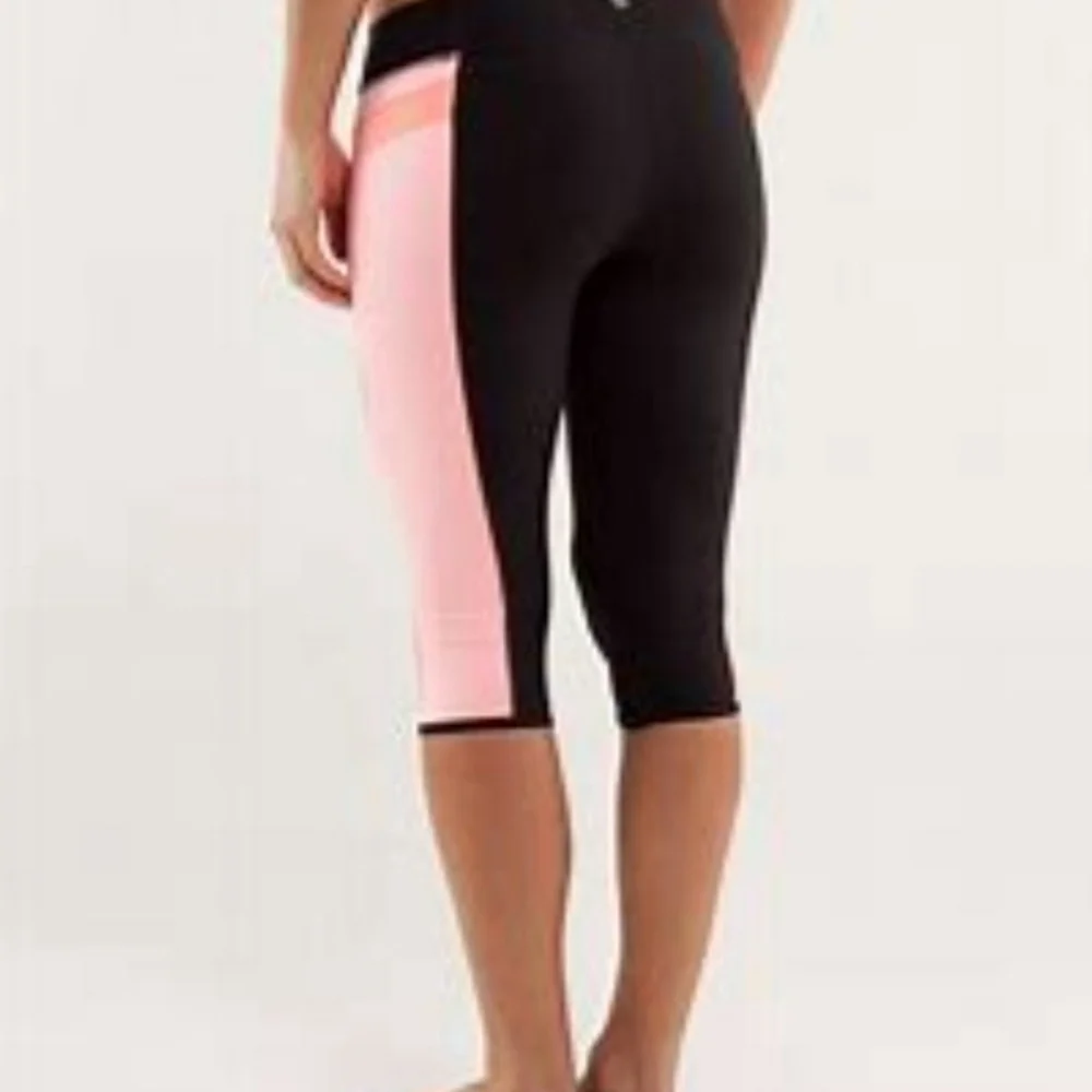 Lululemon Heat it Up Crop Orange Pop Black Coral Pop Orange Size 8 Rare